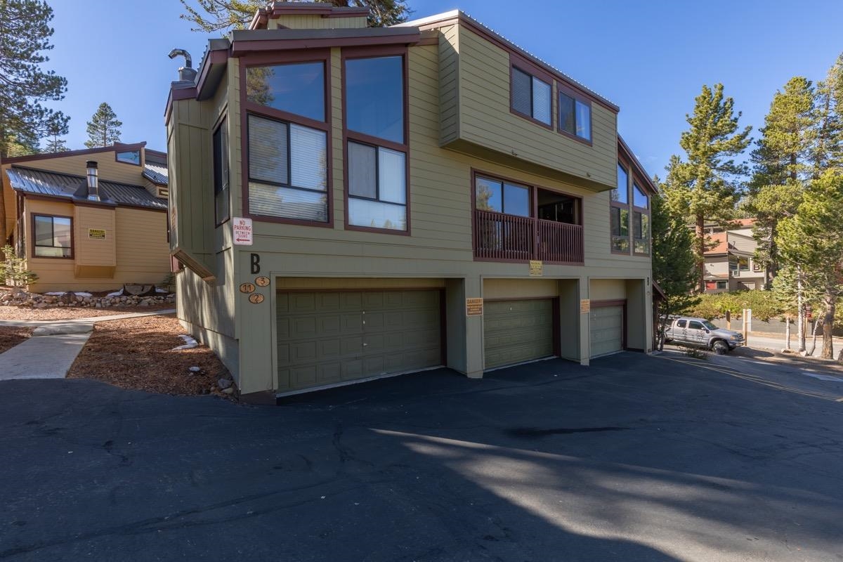 175 Mammoth Slopes Drive, Unit 3 Mammoth Lakes, CA 93546 - Photo 25 of 30 a view of a house with a yard