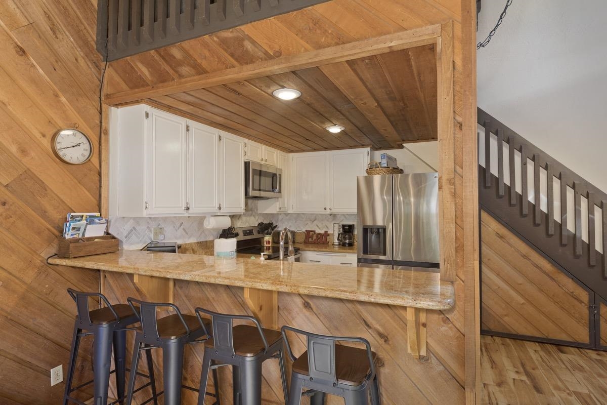 175 Mammoth Slopes Drive, Unit 3 Mammoth Lakes, CA 93546 - Photo 7 of 30 a bathroom with a sink and a mirror