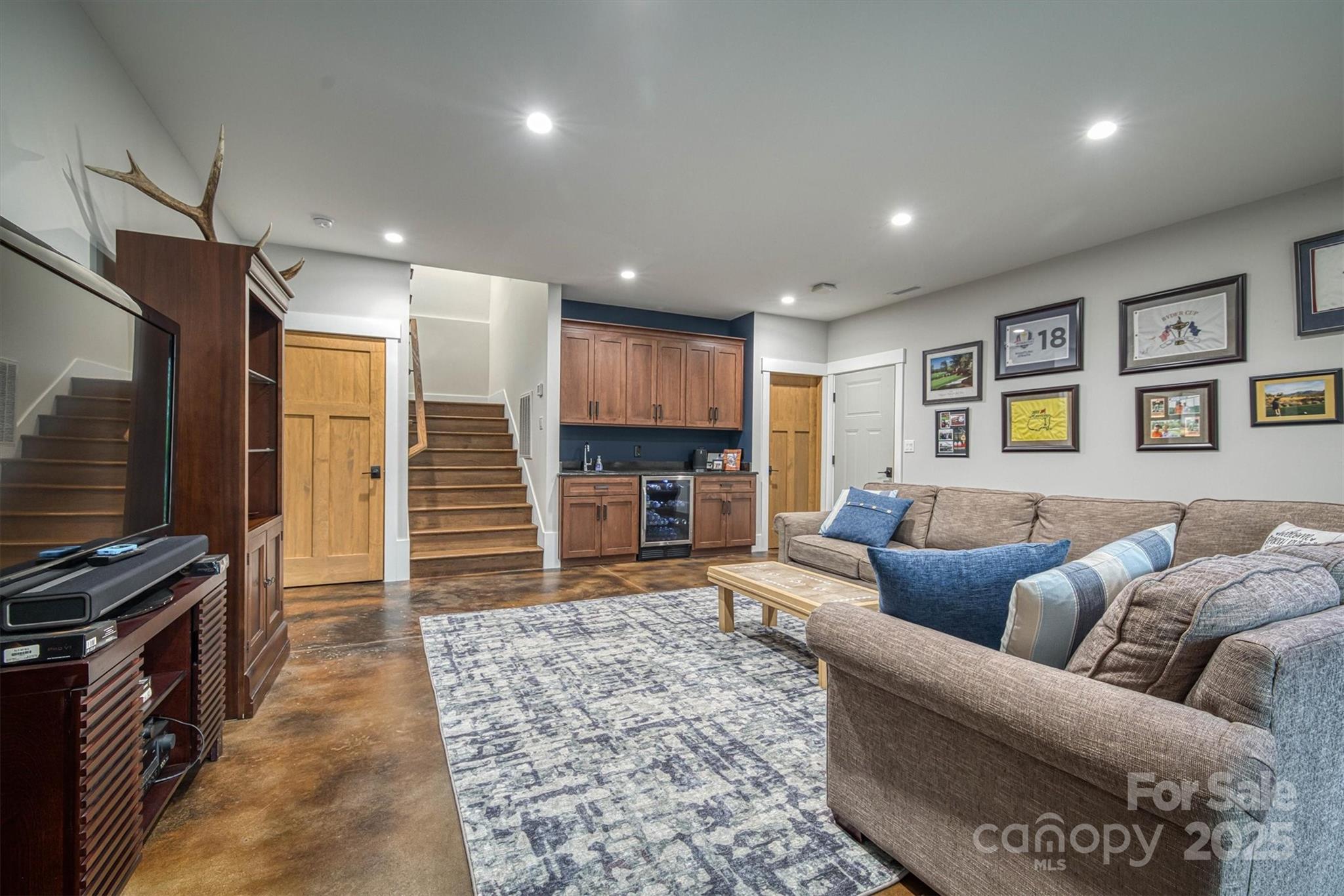 2116 October Drive, Unit 146 Nebo, NC 28761 - Photo 30 of 45 a living room with furniture and a flat screen tv