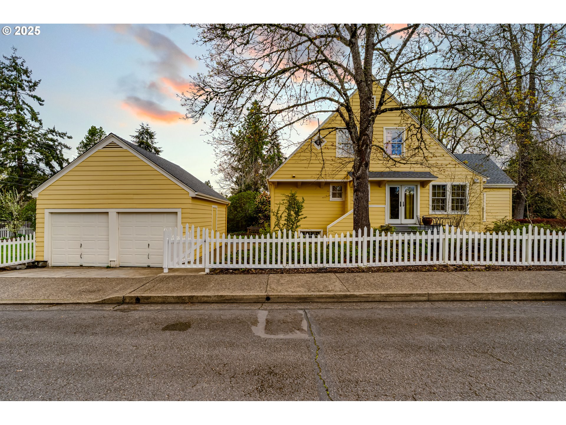 1996 Monroe Street Eugene, OR 97405 - Photo 1 of 47 a front view of a house with a fence