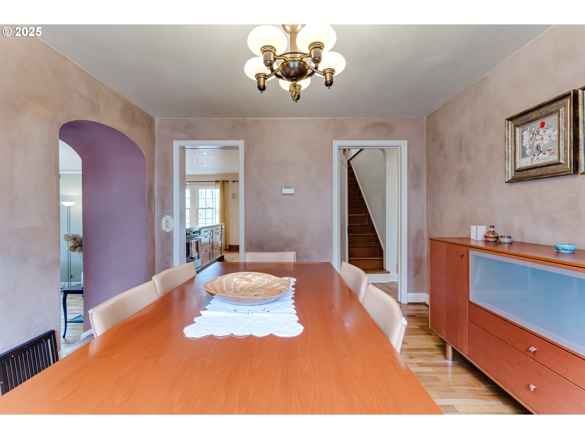 1996 Monroe Street Eugene, OR 97405 - Photo 12 of 47 a bedroom with a bed and a chandelier