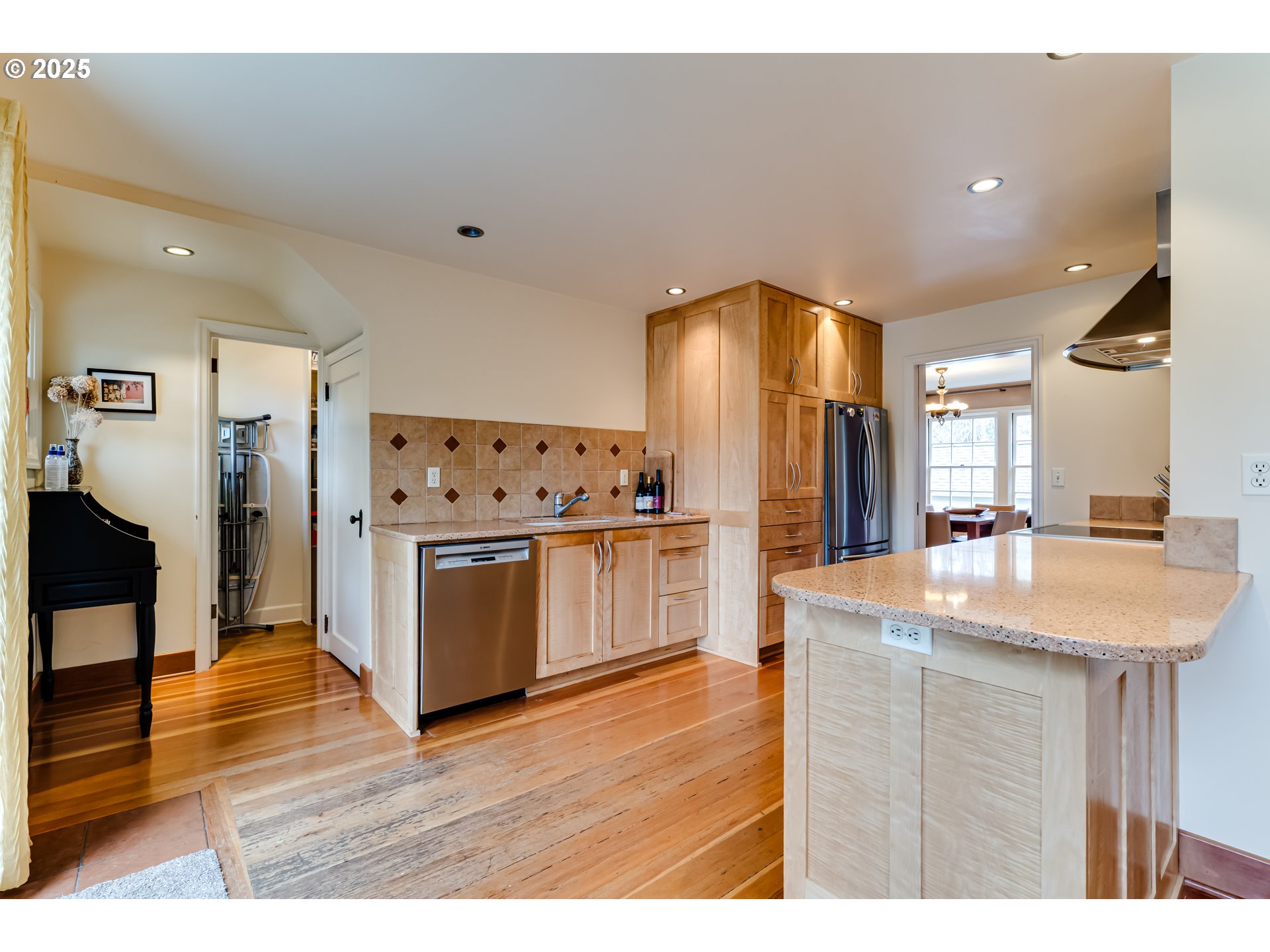 1996 Monroe Street Eugene, OR 97405 - Photo 15 of 47 a kitchen with stainless steel appliances granite countertop a sink and a refrigerator
