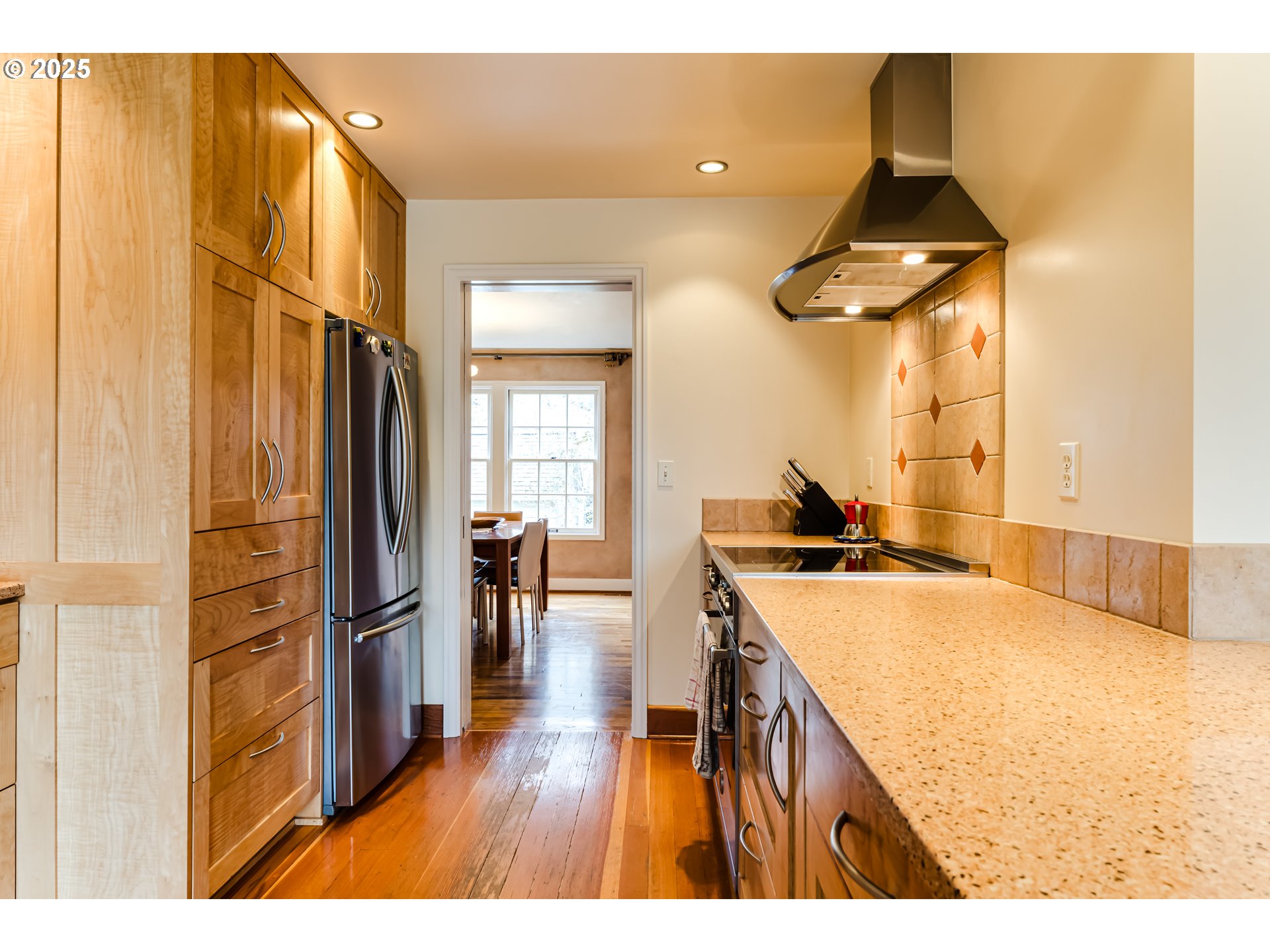 1996 Monroe Street Eugene, OR 97405 - Photo 16 of 47 a kitchen view with wooden floor and outdoor space