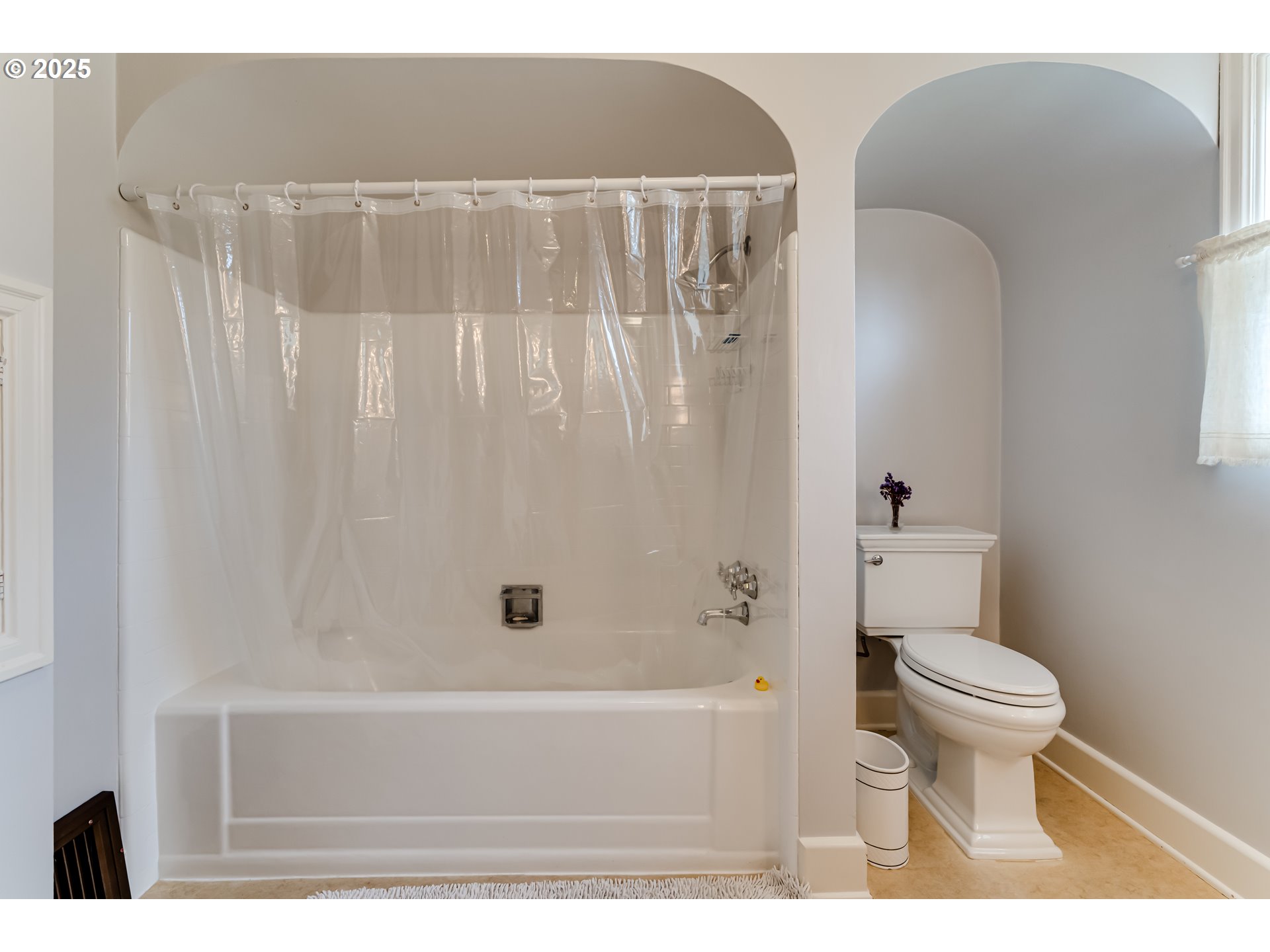 1996 Monroe Street Eugene, OR 97405 - Photo 22 of 47 a bathroom with a toilet and a bathtub