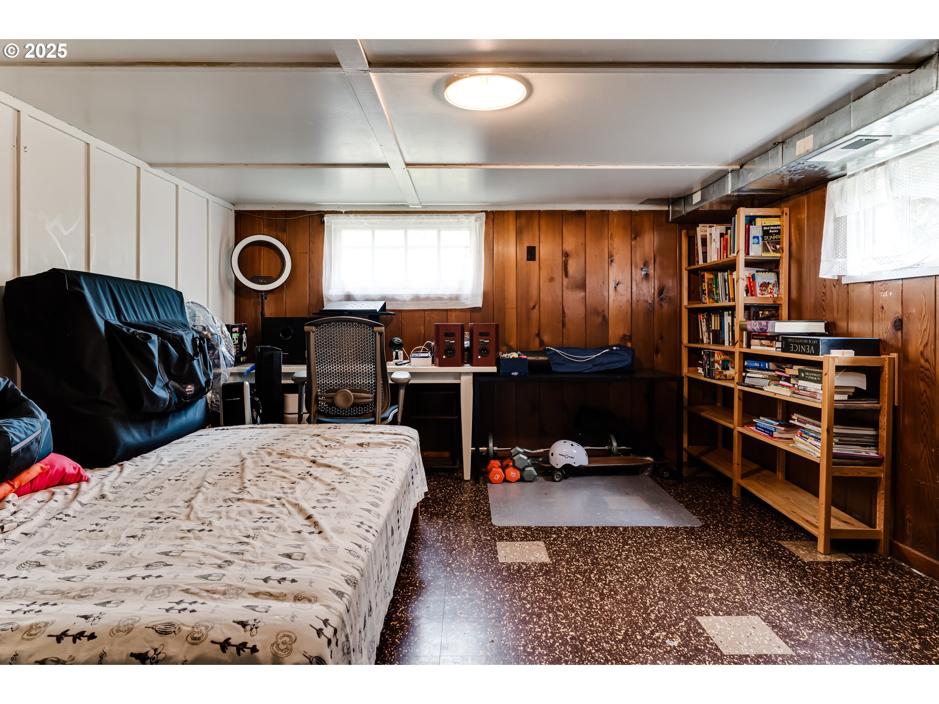 1996 Monroe Street Eugene, OR 97405 - Photo 33 of 47 a living room with furniture a flat screen tv and dresser