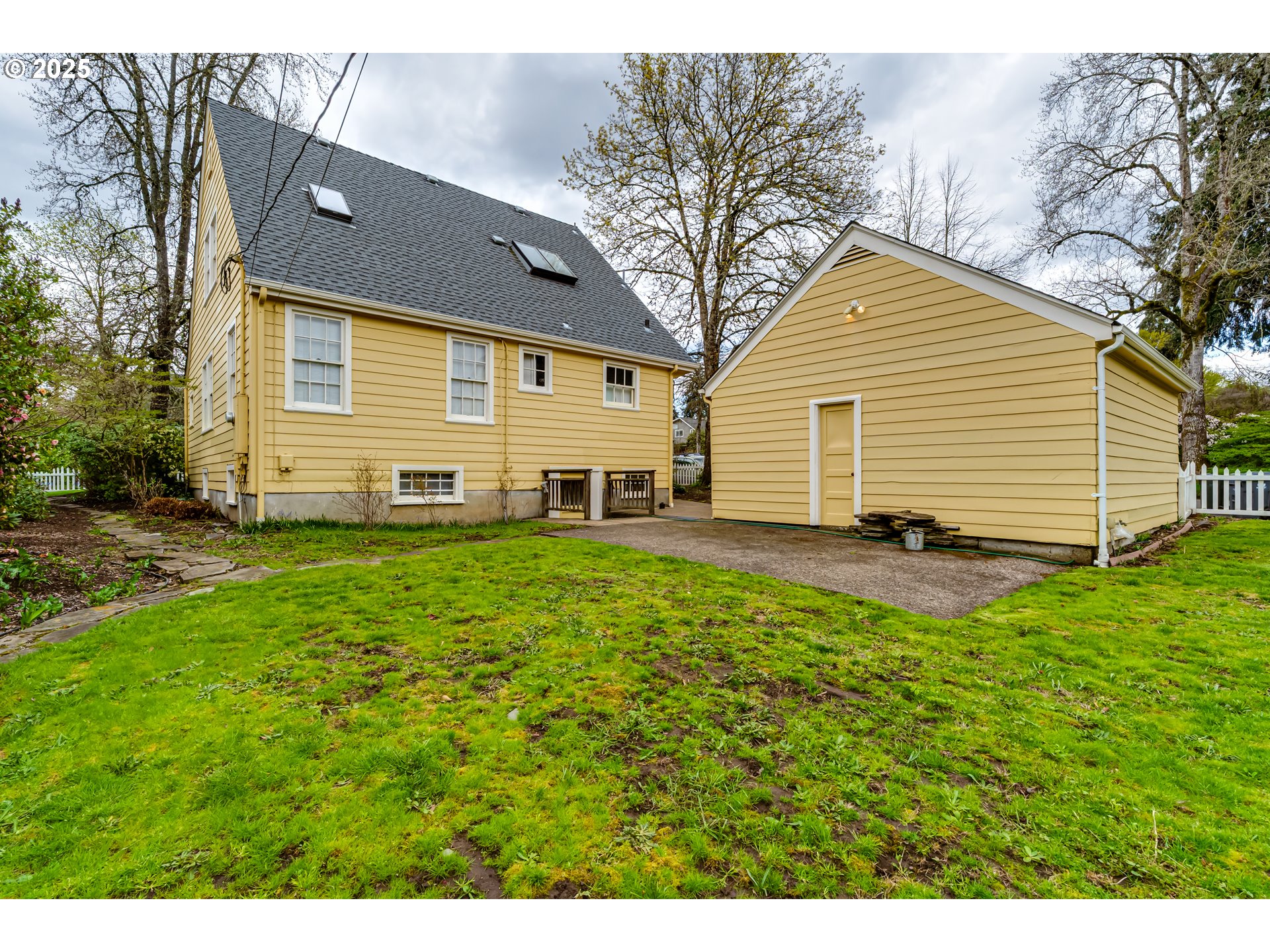 1996 Monroe Street Eugene, OR 97405 - Photo 43 of 47 a front view of a house with a yard