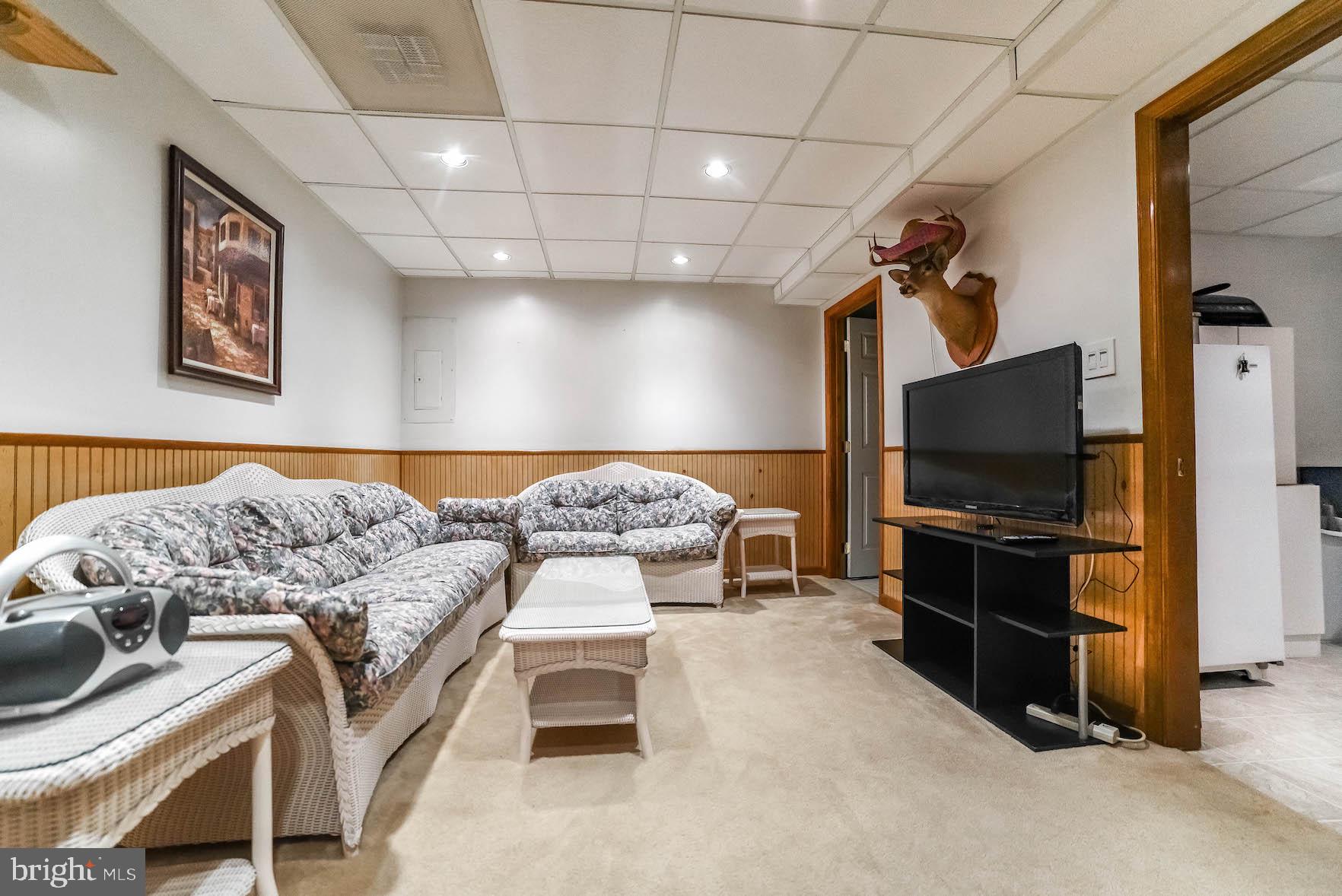 25828 Ricky Drive Hollywood, MD 20636 - Photo 22 of 42 Basement family room length view