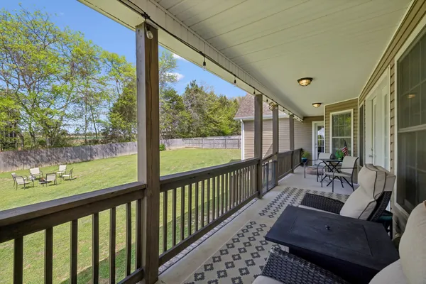 a view of chair and table in the yard