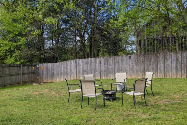 a backyard of a house with lots of green space