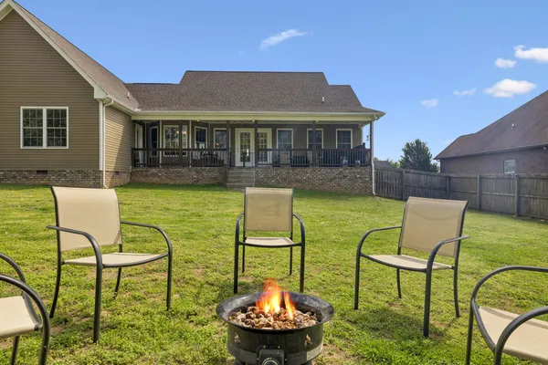 a house view with a garden space