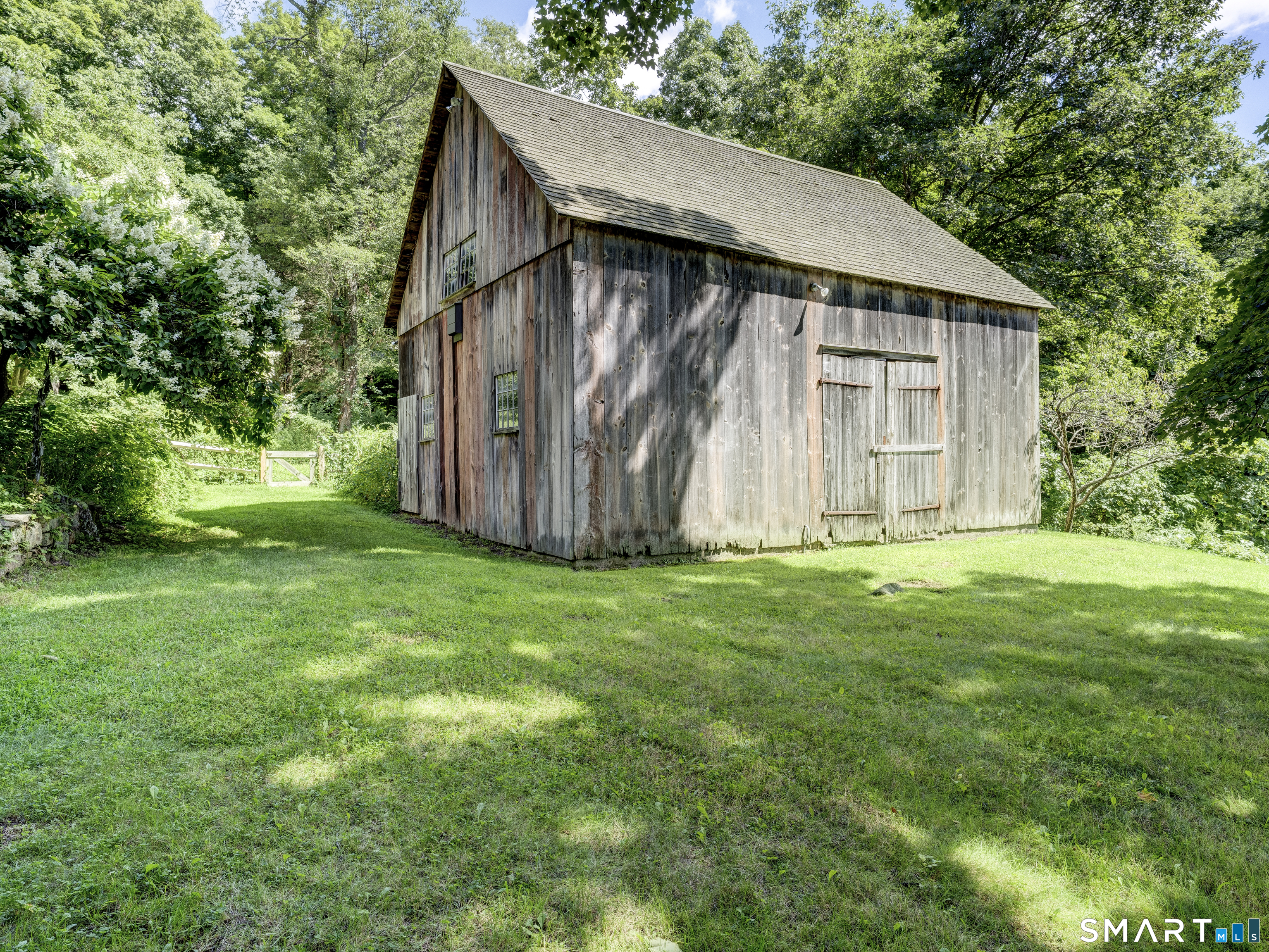 64 Haddam Quarter Road Durham, CT 06422 - Photo 35 of 40 One of several outbuildings, this 18th century barn is a treasure.