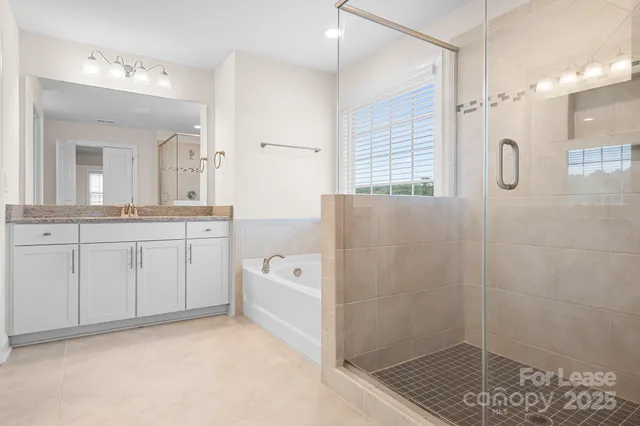 an empty room with mirror