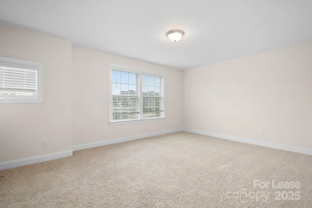 a bathroom with a granite countertop sink a toilet and a bathtub
