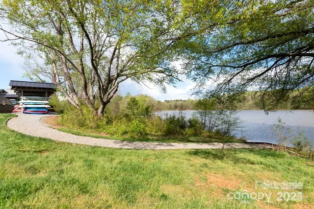 a view of a car park in front of house