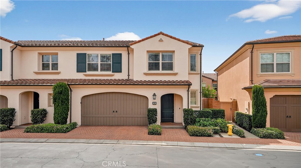 a front view of a house with yard