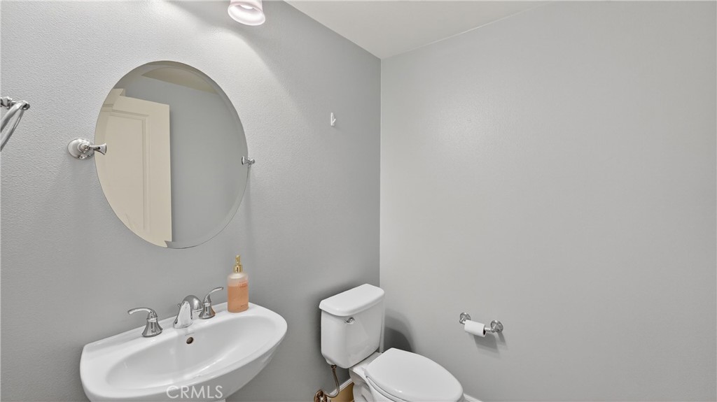 30 Maple Leaf Irvine, CA 92618 - Photo 13 of 19 a bathroom with a toilet sink and mirror
