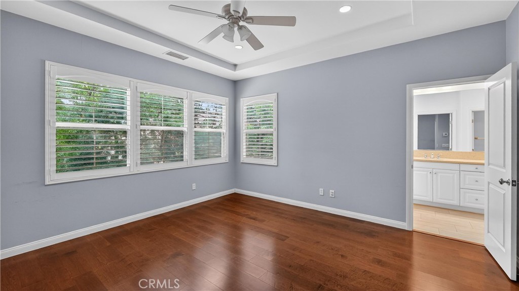 30 Maple Leaf Irvine, CA 92618 - Photo 18 of 19 a view of an empty room with a window and wooden floor