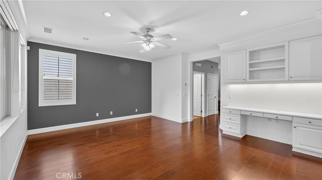 30 Maple Leaf Irvine, CA 92618 - Photo 3 of 19 a view of an empty room with a window and wooden floor