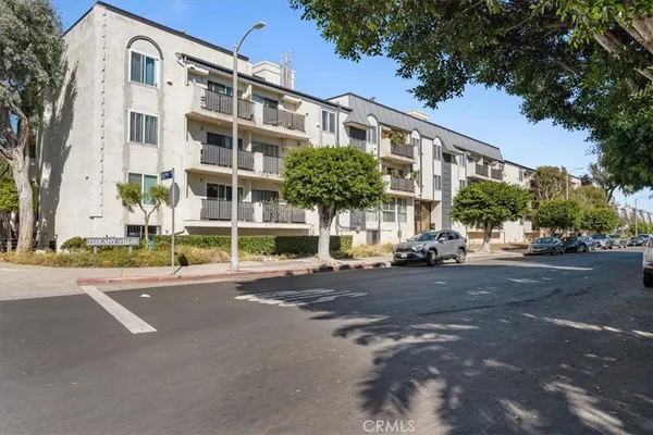 a view of a building with a street