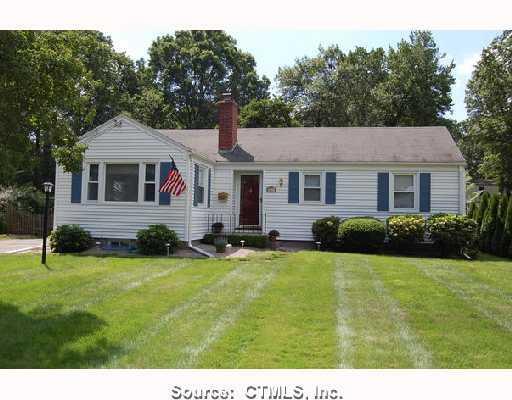 92 Clearfield Road Wethersfield, CT 06109 - Photo 1 of 1 a front view of a house with yard and green space