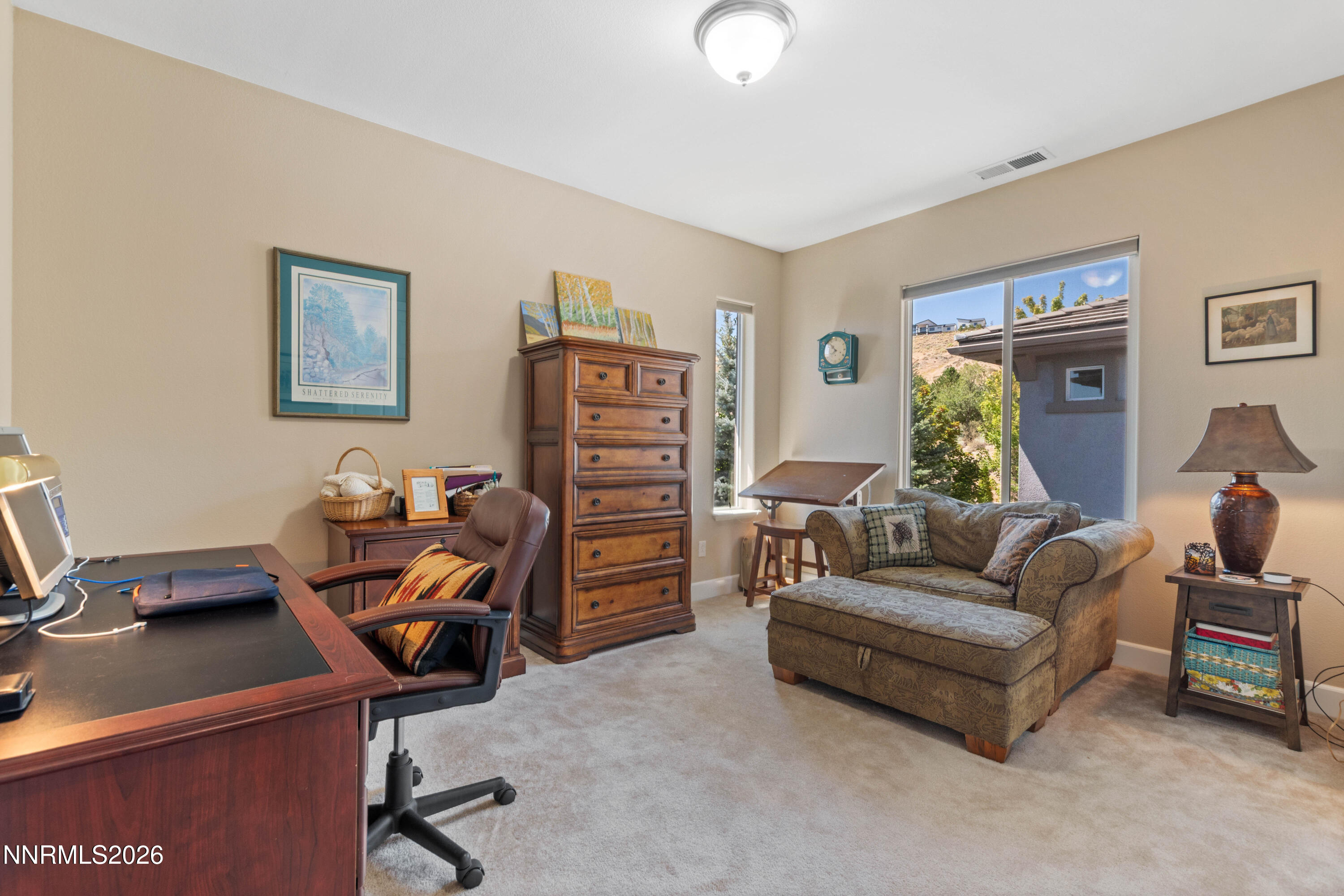 2395 Ridge Field Trail Reno, NV 89523 - Photo 31 of 44 a livingroom with workspace and a couch