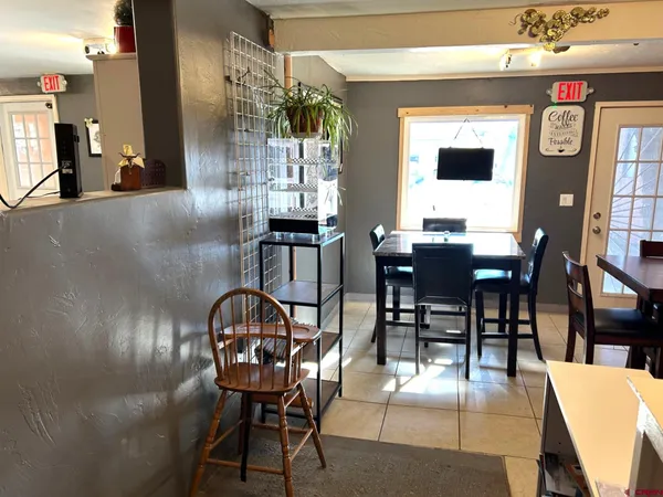a view of a dining room with furniture