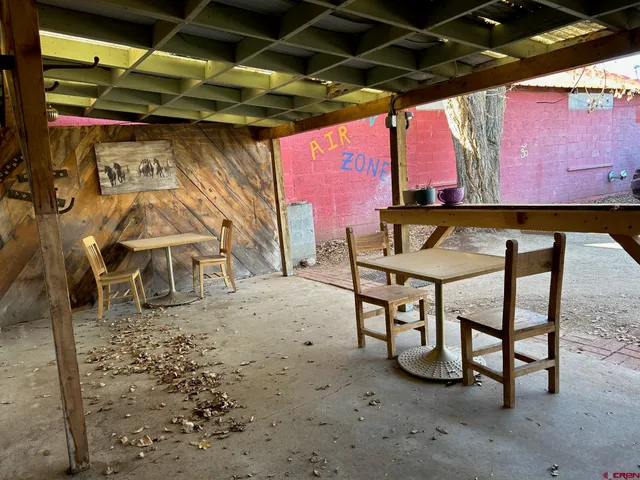 a view of an outdoor space with seating area