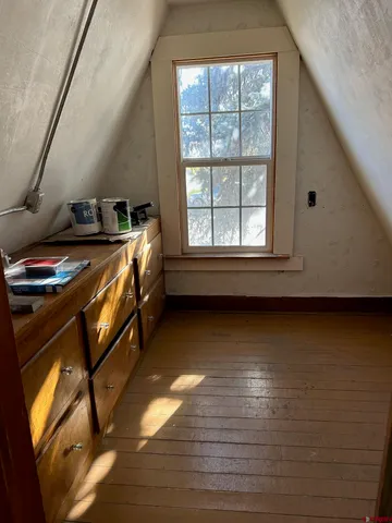 a bathroom with a sink and a window