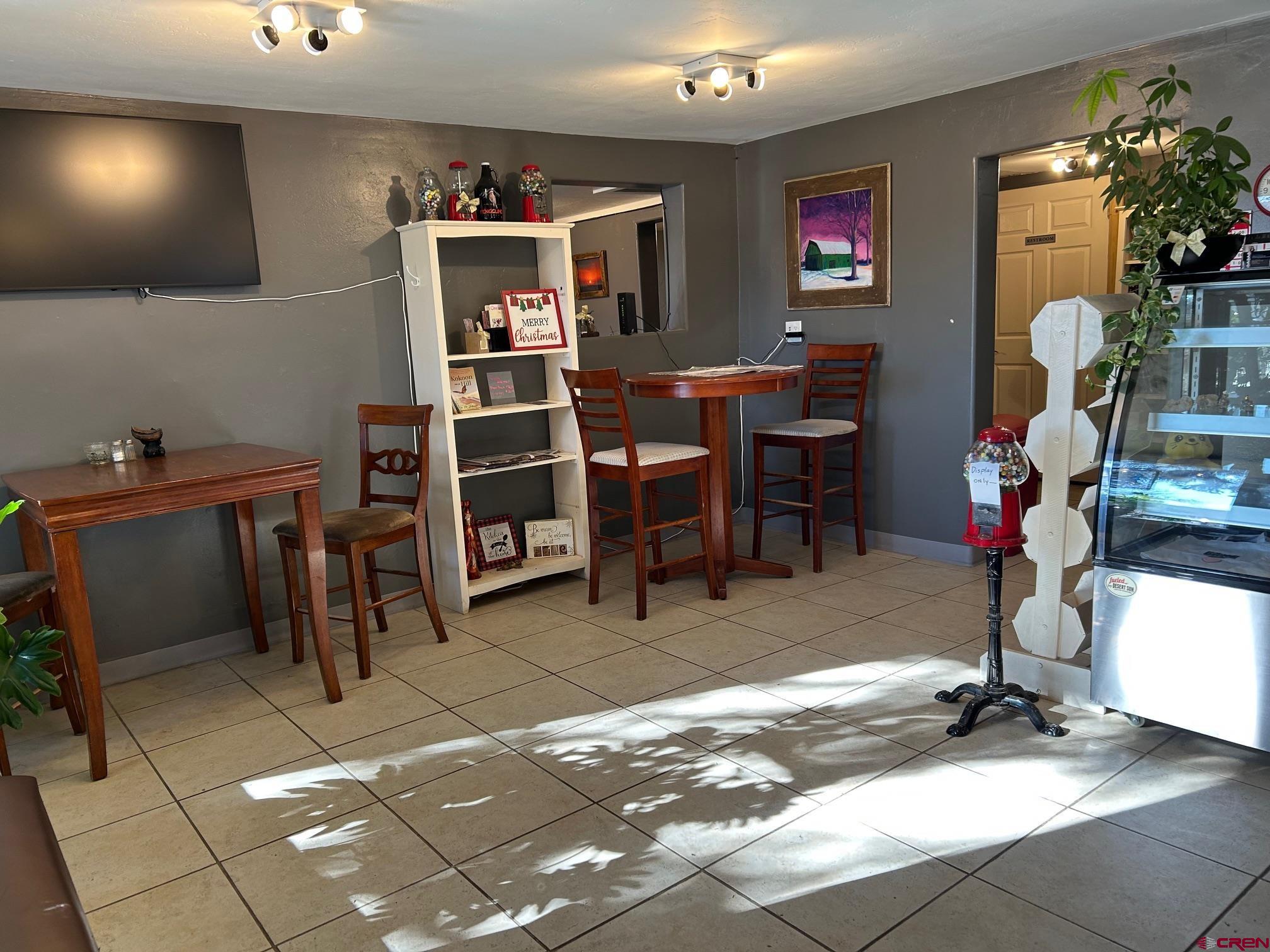 318 East Main Street Cortez, CO 81321 - Photo 7 of 27 a view of a workspace with furniture