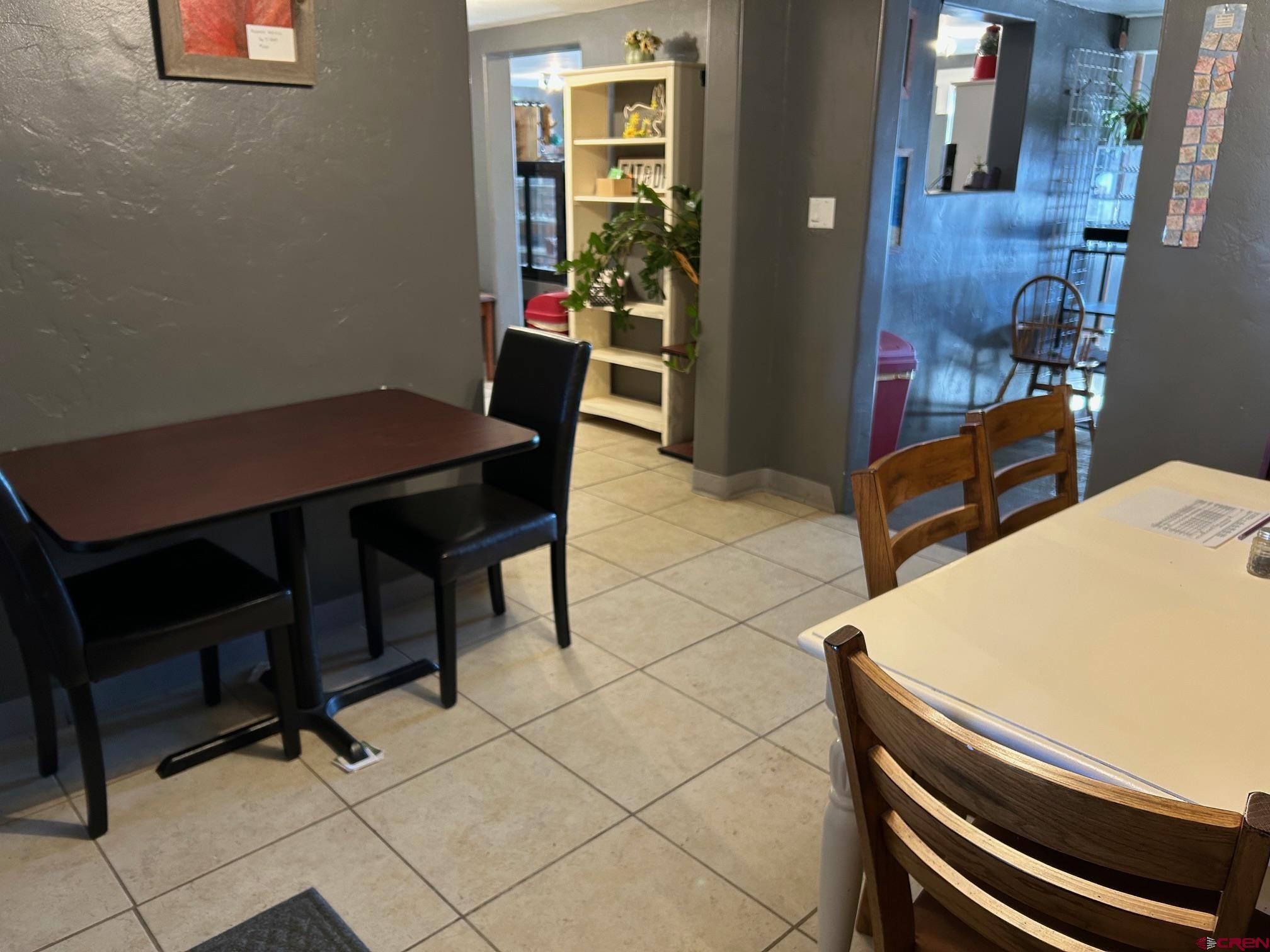 318 East Main Street Cortez, CO 81321 - Photo 10 of 27 a view of a room with furniture and wooden floor