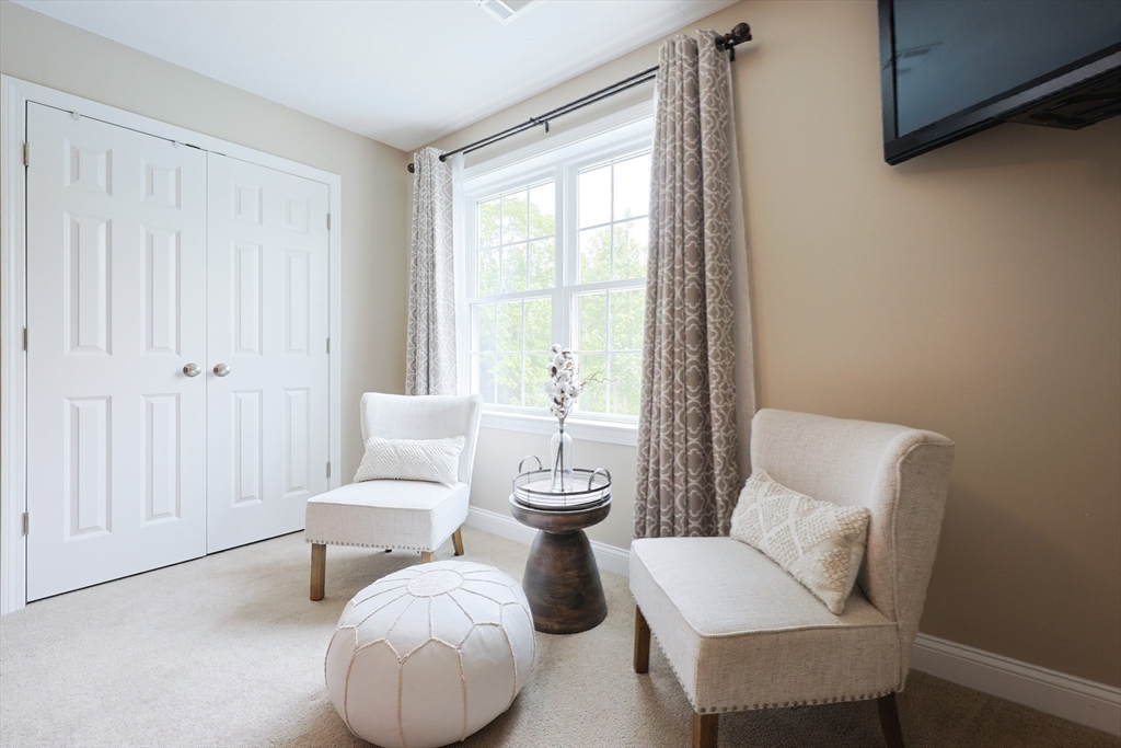5 Mendon Road, Unit D Attleboro, MA 02703 - Photo 21 of 38 a living room with furniture and a window