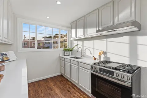 a bedroom with bed and a window
