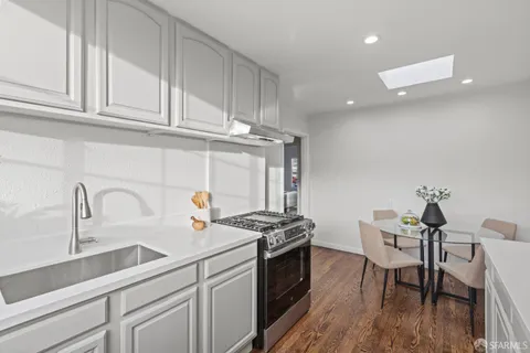 a bedroom with a bed and a lamp