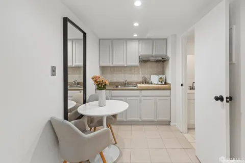 a bedroom with bed and a window