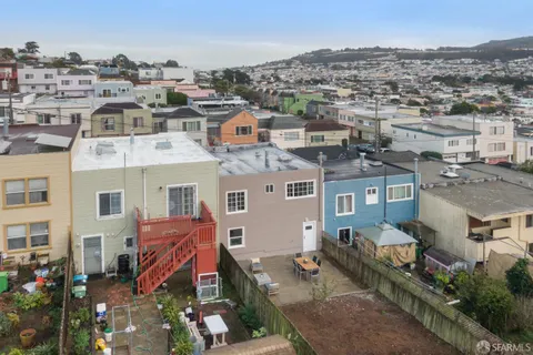a view of a cafe with sitting area