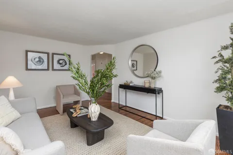 a kitchen with stainless steel appliances granite countertop a refrigerator sink and cabinets