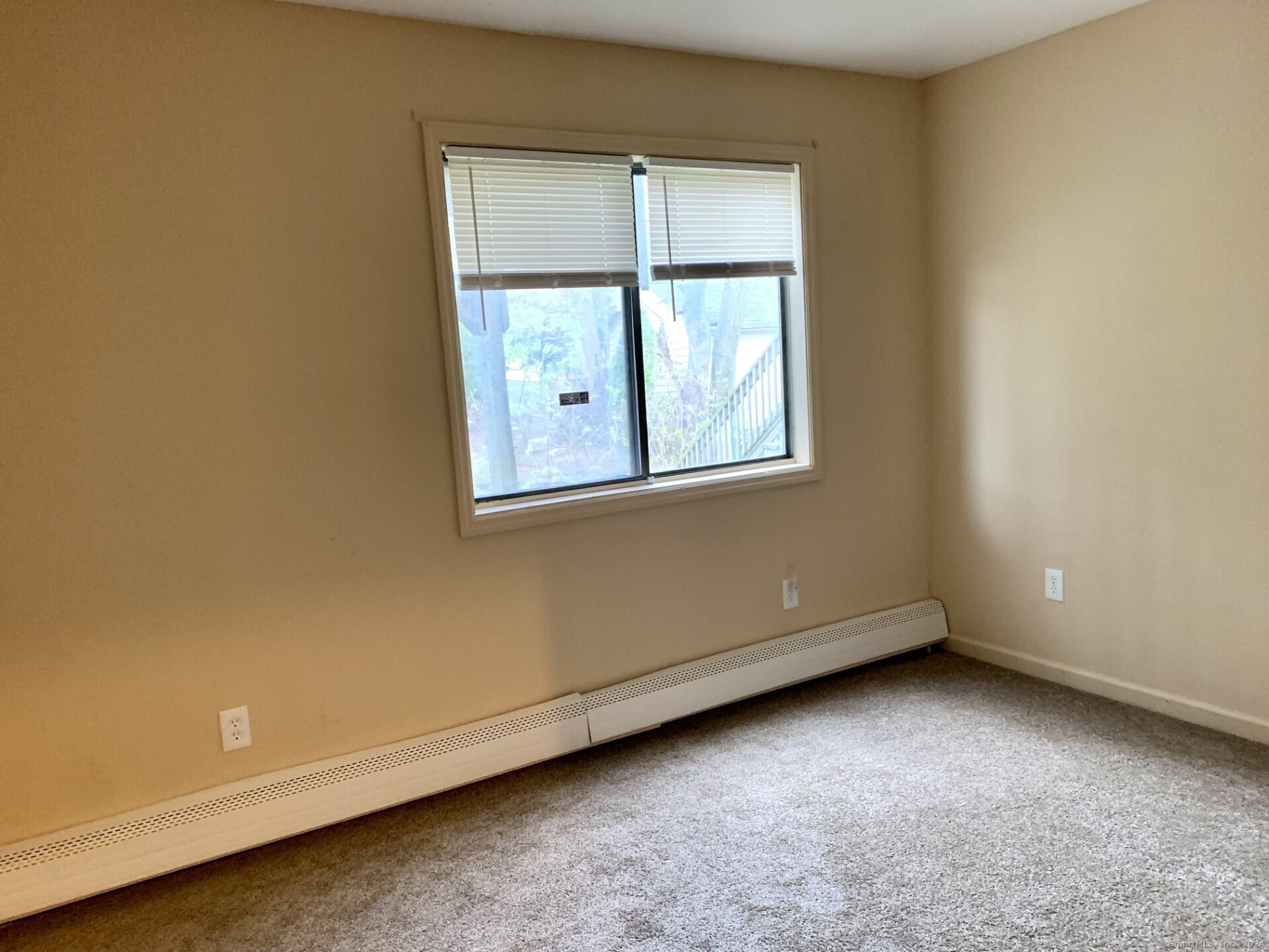1380 Kossuth Street Bridgeport, CT 06608 - Photo 12 of 22 an empty room with windows