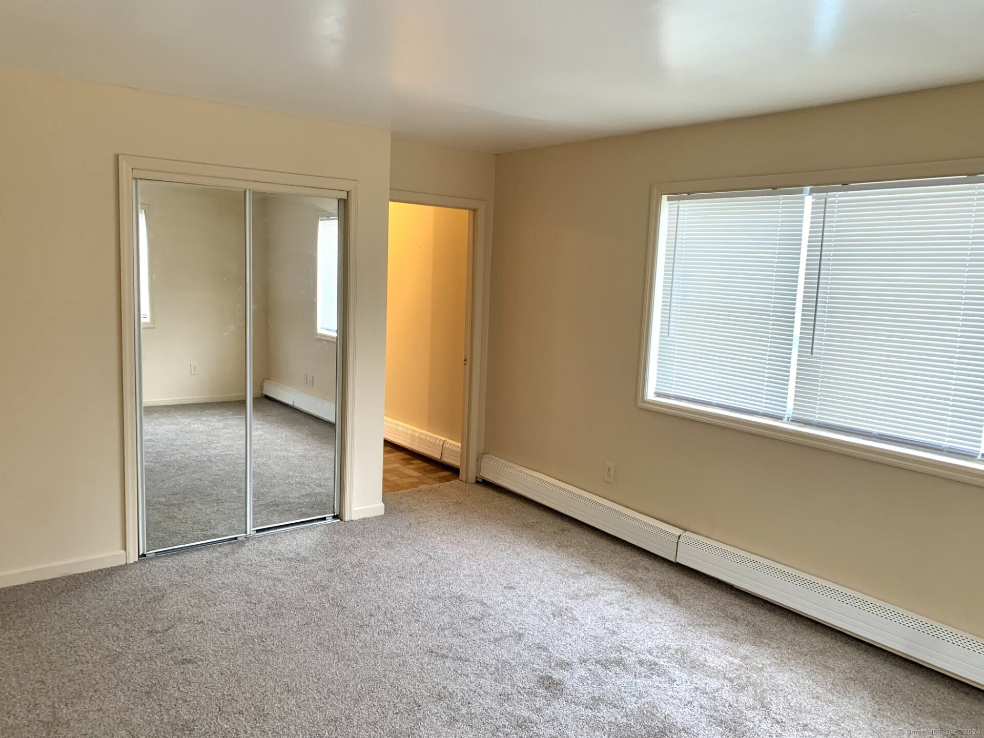 1380 Kossuth Street Bridgeport, CT 06608 - Photo 14 of 22 an empty room with a window