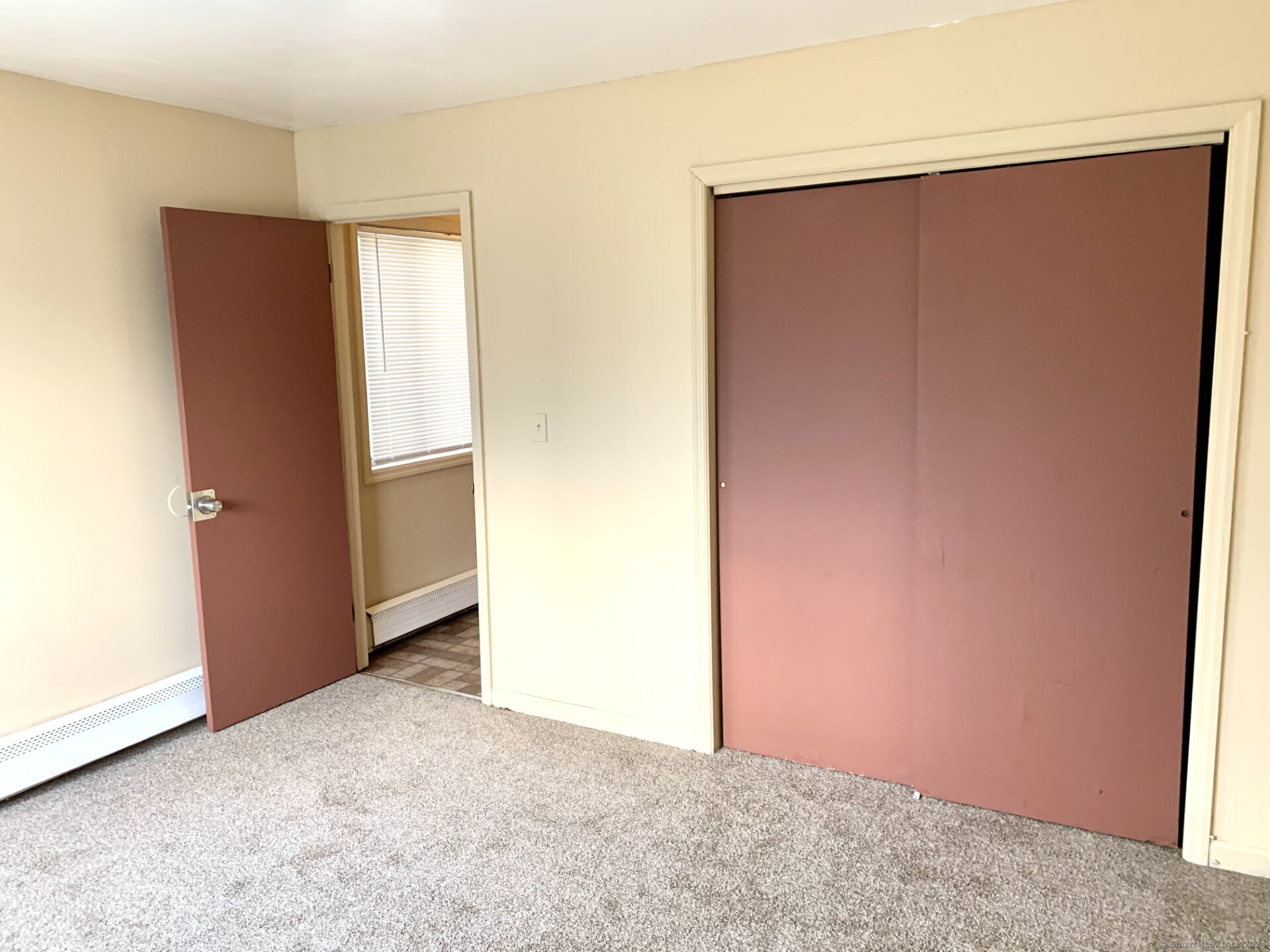 1380 Kossuth Street Bridgeport, CT 06608 - Photo 16 of 22 an empty room with windows