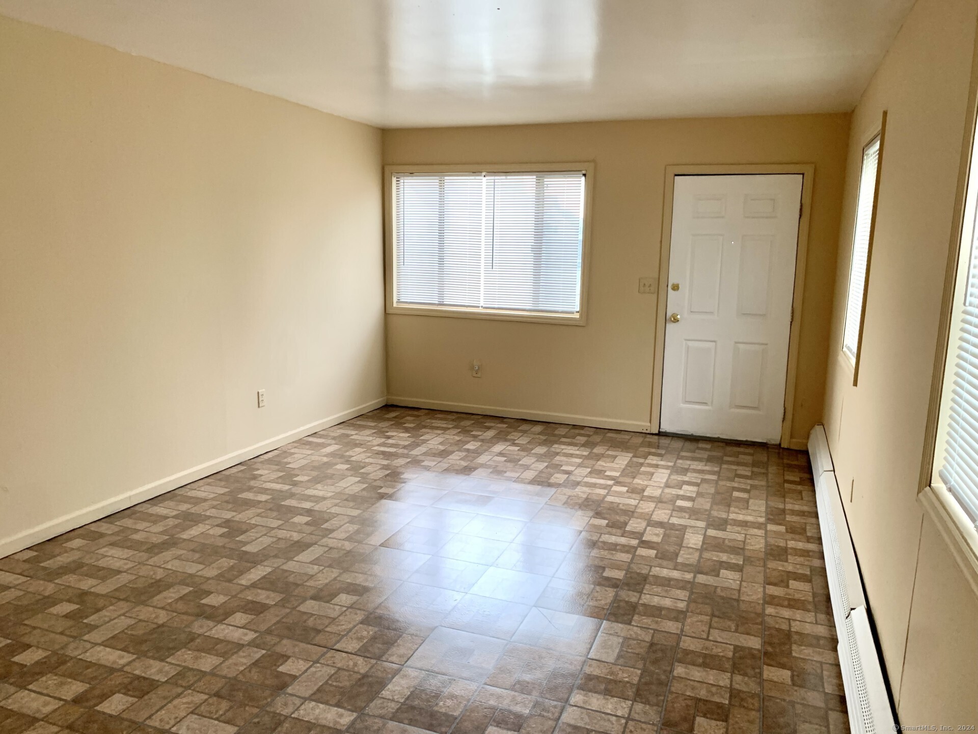1380 Kossuth Street Bridgeport, CT 06608 - Photo 3 of 22 a view of an empty room and window