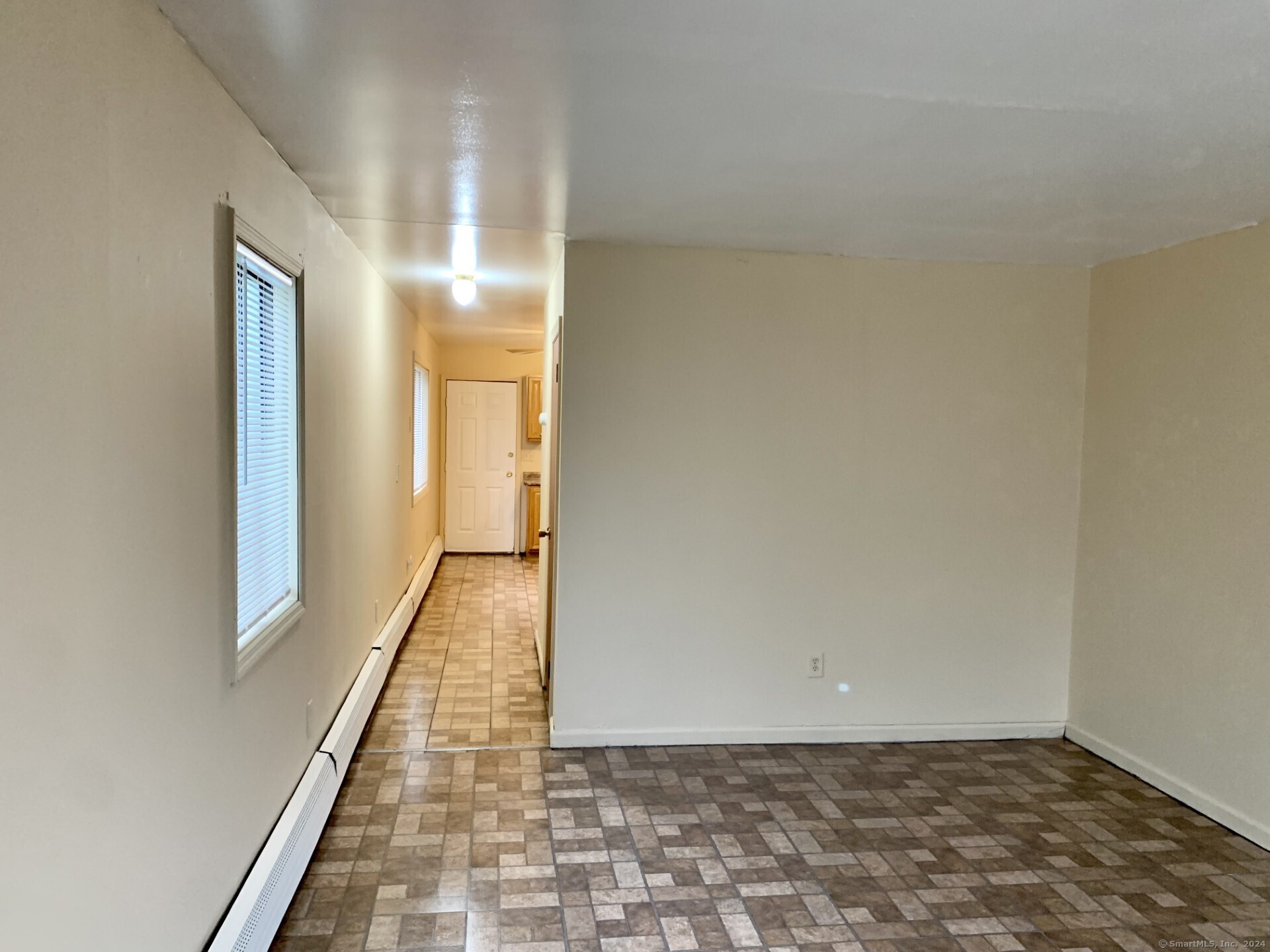 1380 Kossuth Street Bridgeport, CT 06608 - Photo 5 of 22 a view of a hallway