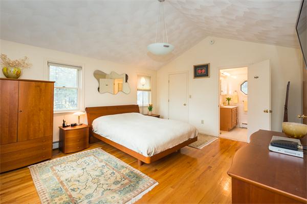 1 4th Street Lexington, MA 02420 - Photo 14 of 22 a bedroom with a bed and a couch