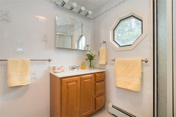1 4th Street Lexington, MA 02420 - Photo 15 of 22 a utility room with a sink dryer and washer