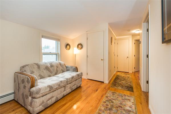 1 4th Street Lexington, MA 02420 - Photo 16 of 22 a living room with furniture and a rug