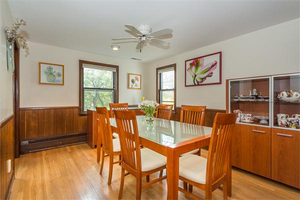1 4th Street Lexington, MA 02420 - Photo 5 of 22 a view of a dining room with furniture and chandelier