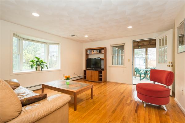 1 4th Street Lexington, MA 02420 - Photo 7 of 22 a living room with furniture and a window