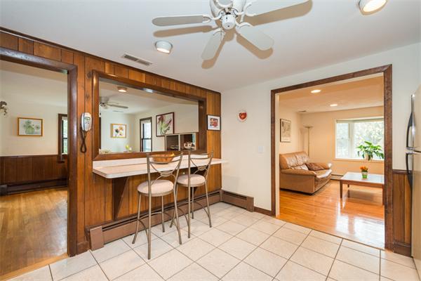 1 4th Street Lexington, MA 02420 - Photo 9 of 22 a view of a livingroom with furniture and a dining table