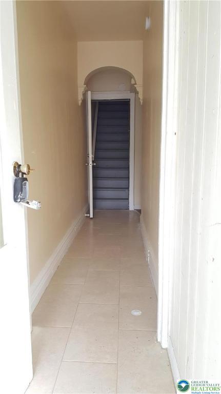 541 Washington Street, Unit 2 Allentown, PA 18102 - Photo 2 of 7 a view of room with stairs and a hallway