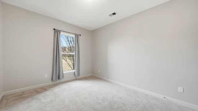 a kitchen with a sink and a refrigerator