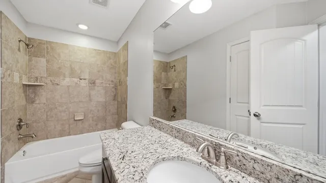 a view of a hallway with stairs